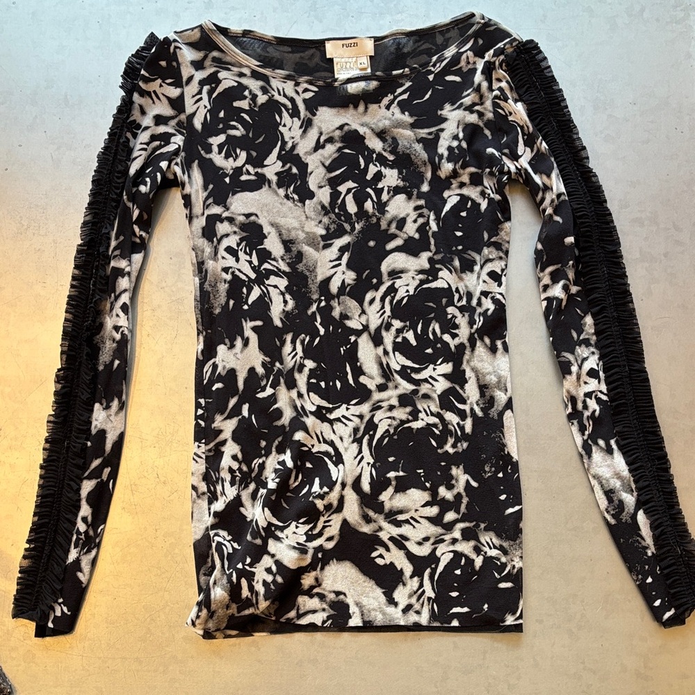 Fuzzi black and white roses print with sleeve embellishments.